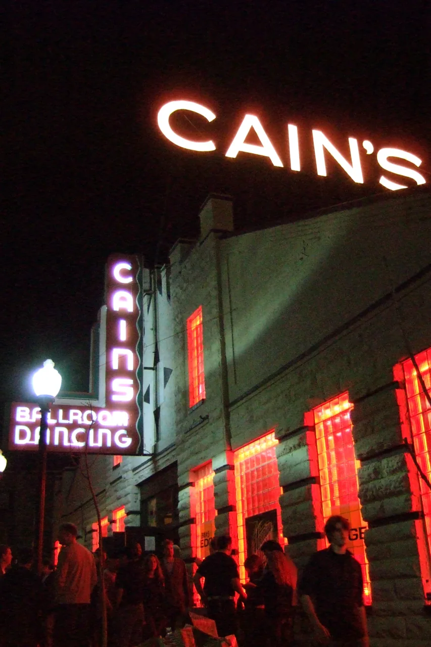 Cain’s Ballroom neon signs and entrance at night in Tulsa