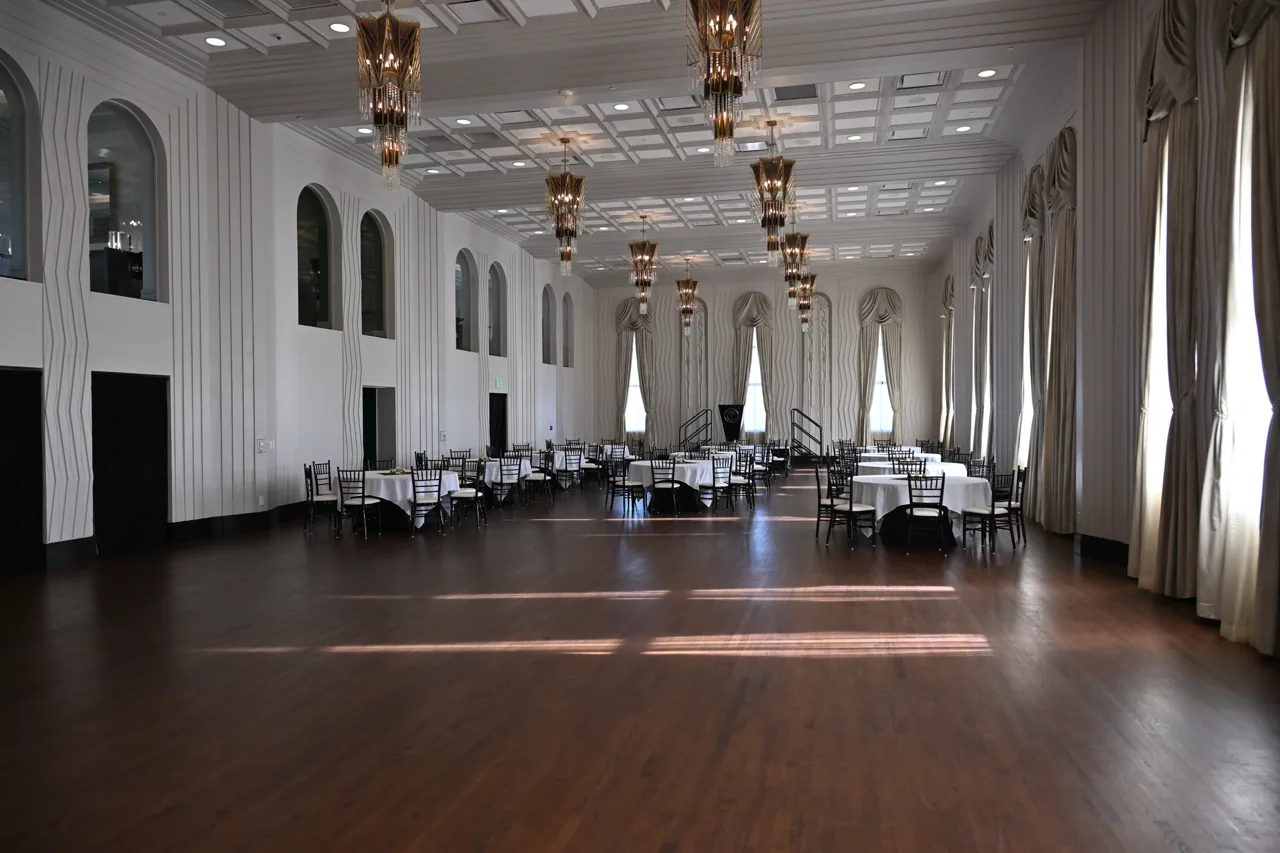 Tulsa Club Hotel ballroom with tall windows and chandeliers