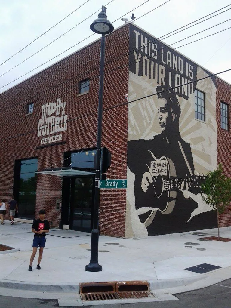 Woody Guthrie Center exterior and mural in Tulsa